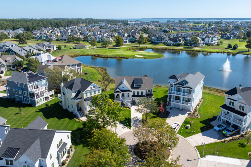 Aerial Drone Picture of a modern Luxury House in luxury community with lakes and golf course